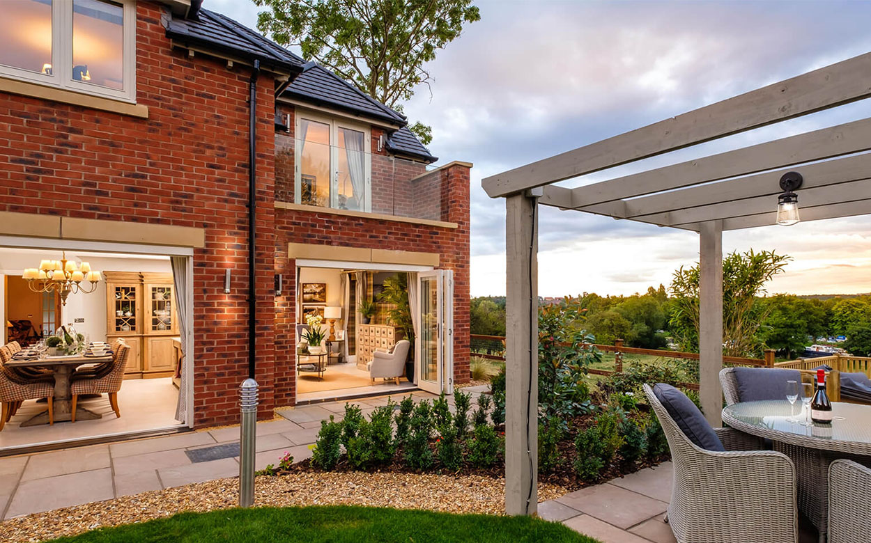 Patio outside a brick house